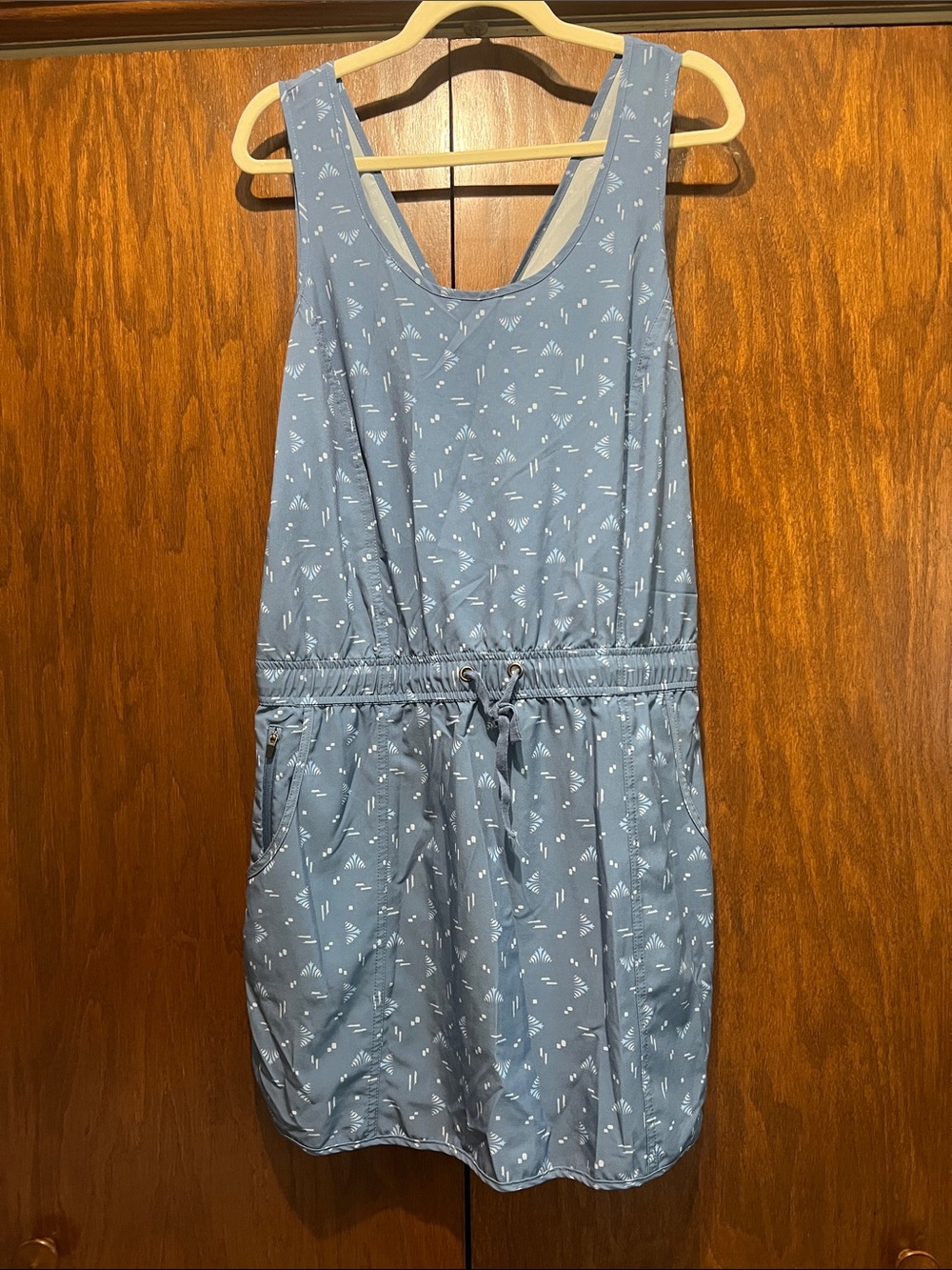 Sleeveless Blue Drawstring Athleisure Mini Dress with Subtle Print